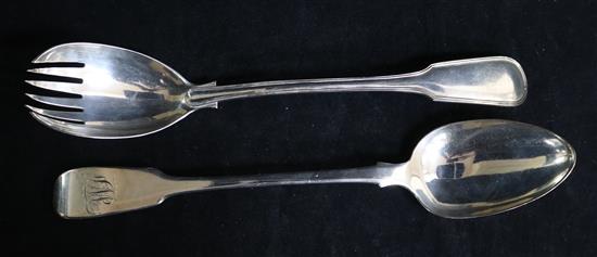A William IV fiddle pattern silver basting spoon, London 1934, A B Savory & sons and a salad server, London 1937, Hayne & Cater
